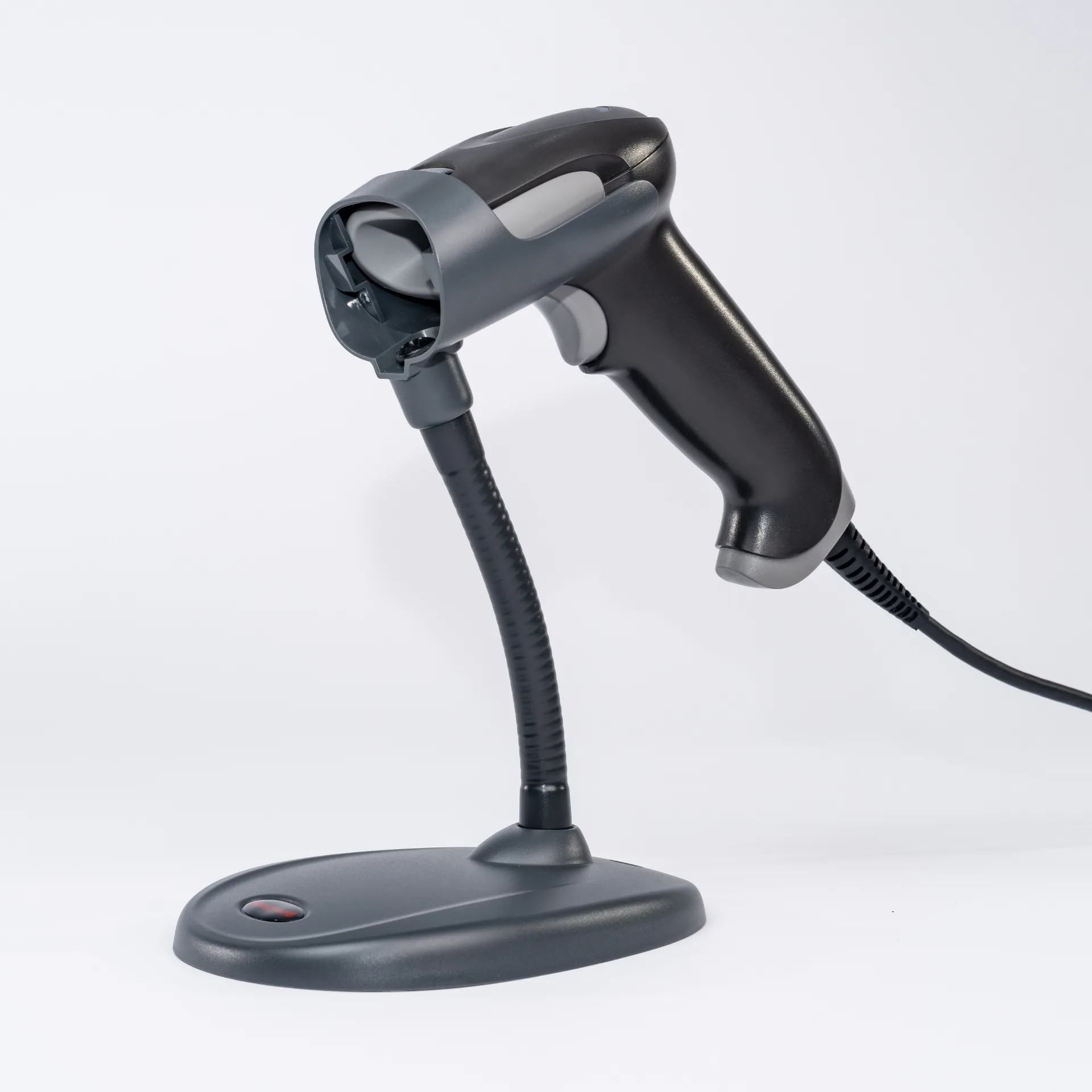 Barcode-Scanner Honeywell Voyager 1470g – Linke Seitenansicht im Standfuß mit Halterung, Griff, Kabel und Scanfenster